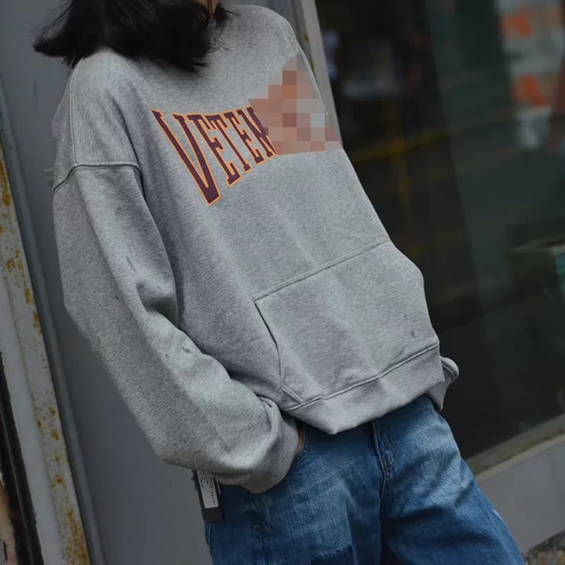 Кобрендовый свитер Vetements x Champion M серого цвета