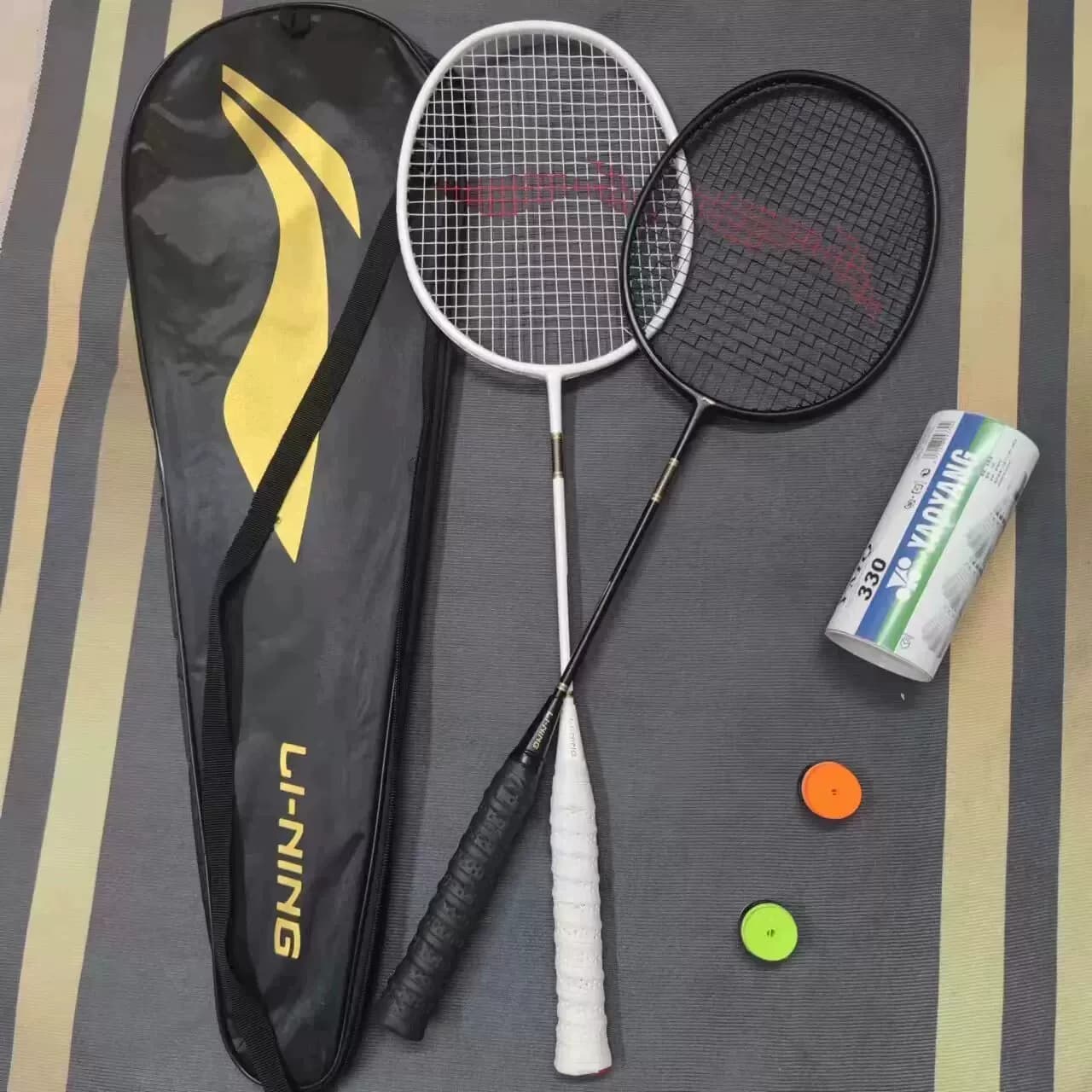 Бадминтонная ракетка Li Ning full carbon, подаренная семьей, две, почти новая, первоначальная цена - более 500, сейчас 40 за пару из 80, бесплатная с…