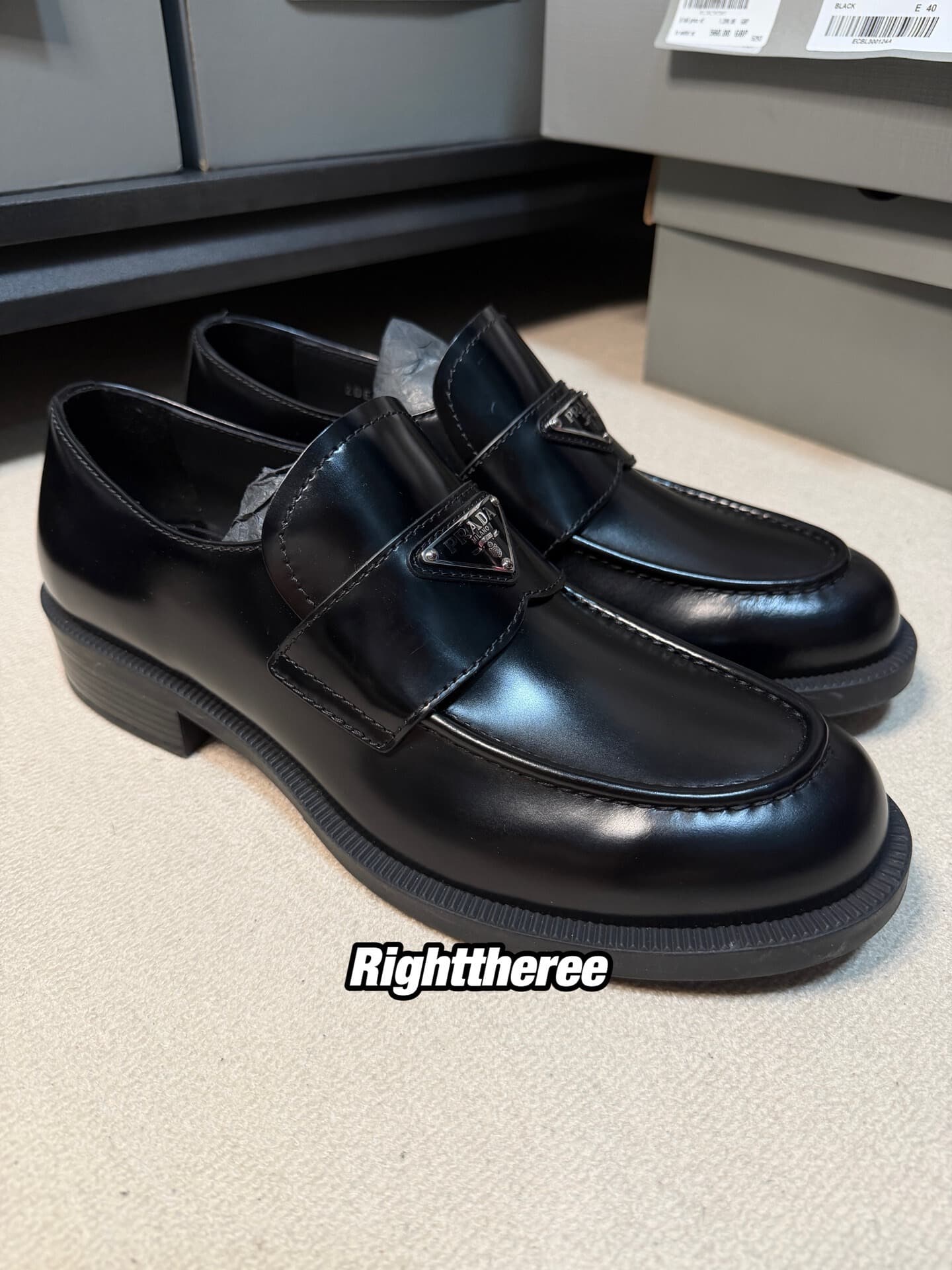 Мужские черные мокасины с капюшоном и круглым носком из воловьей кожи PRADA Prada черного цвета