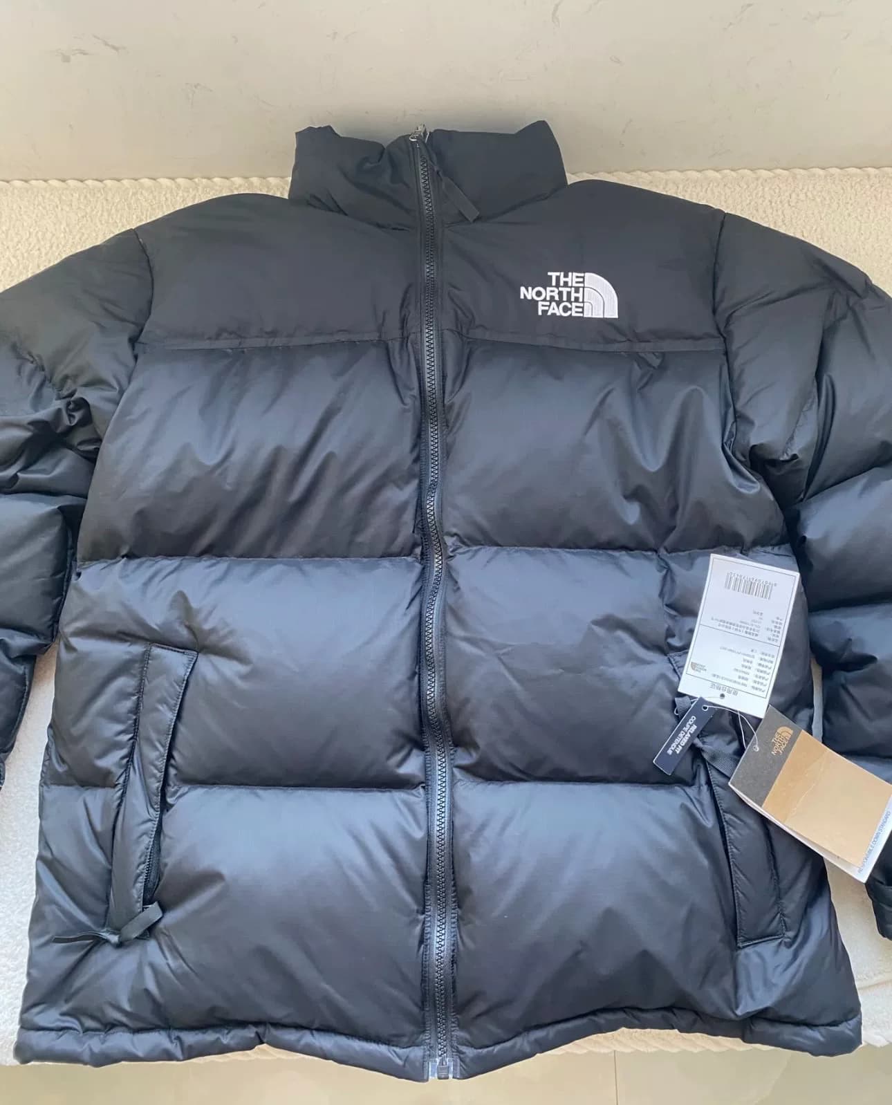Однотонный пуховик THE NORTH FACE FW23